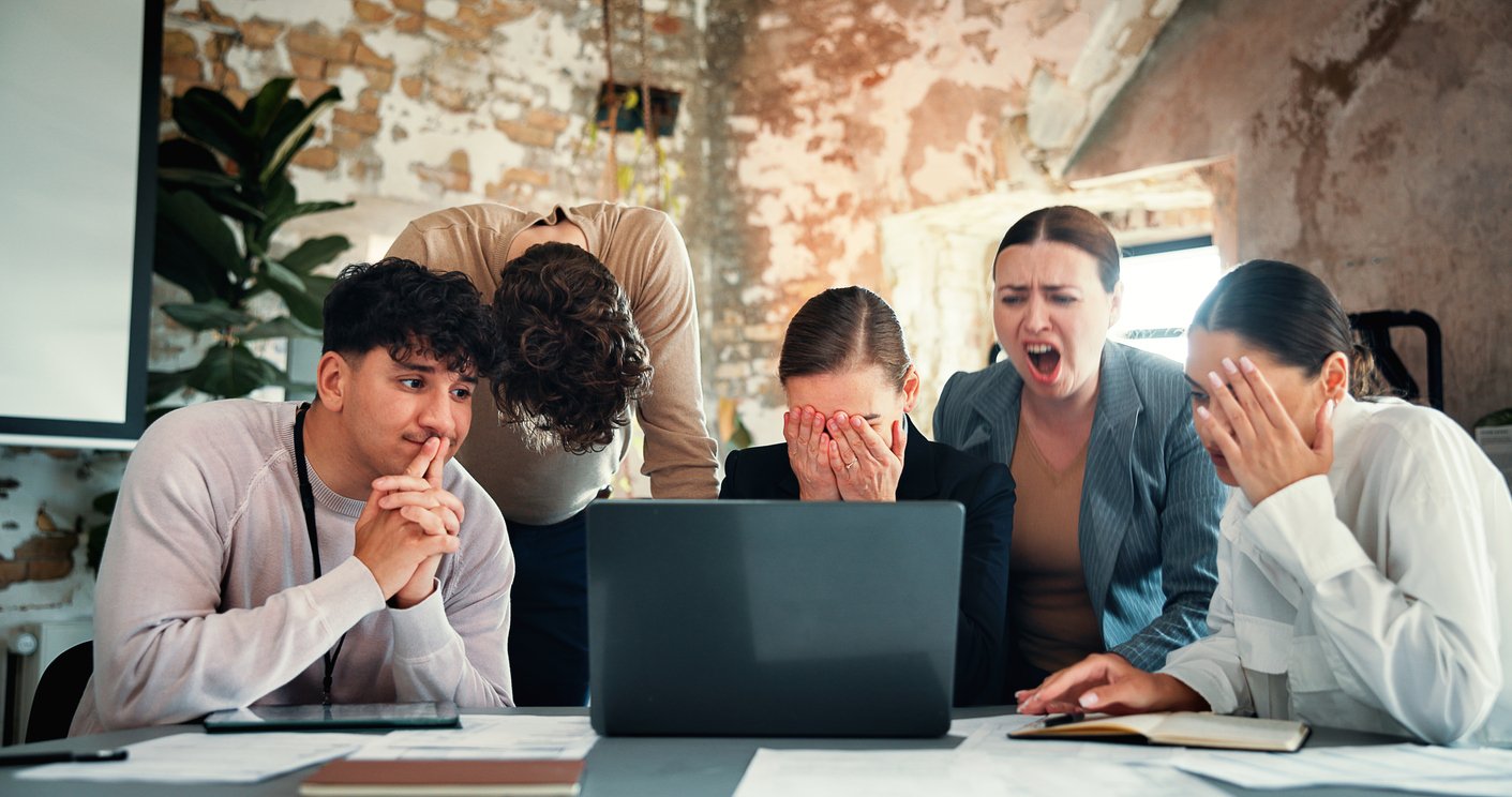 stress, laptop and business people in meeting, upset and financial crisis with bad review. trading fail, men or women in office, computer and stock market crash with negative results and disappointed